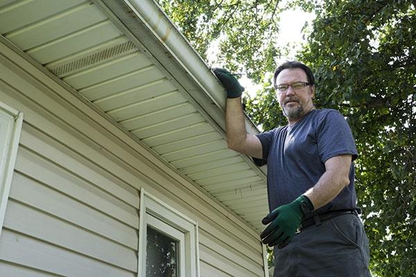 Gutter Cleaning of Lansing employees